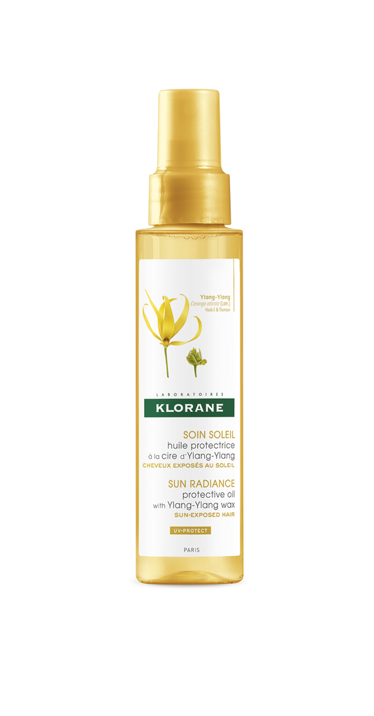 Klorane Capilar Óleo Ylang Ylang para cabelos expostos ao sol protege a fibra capilar e a cor do cabelo. Nutre em profundidade