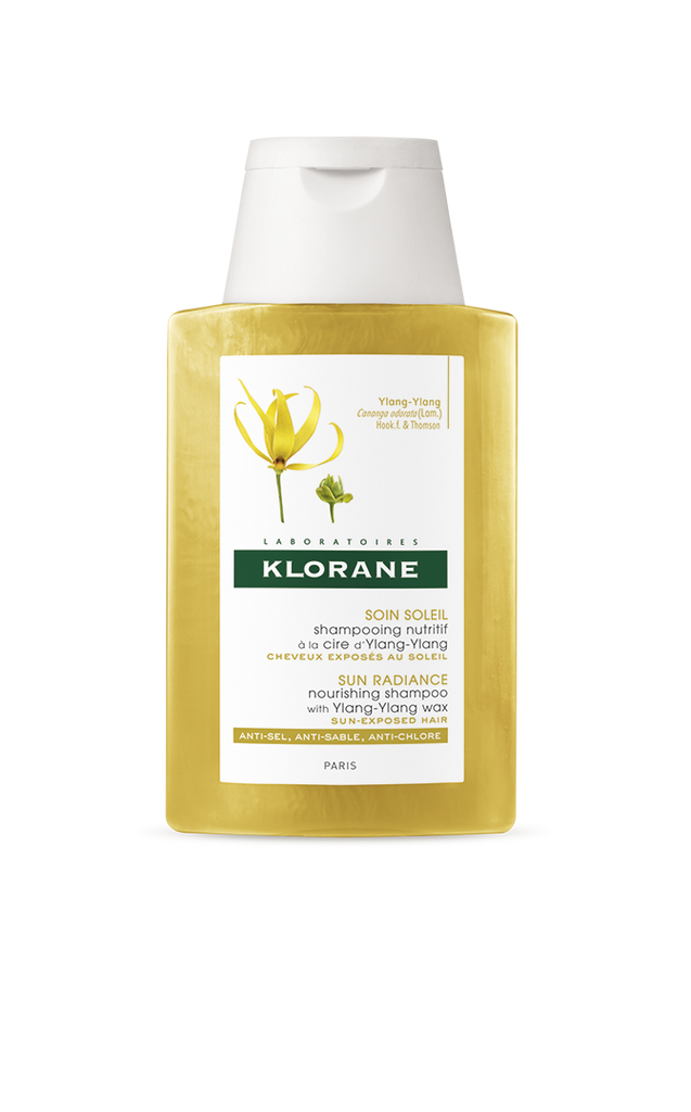 Klorane Capilar Champô Ylang Ylang para cabelos expostos ao sol nutre e protege a fibra capilar e a cor do cabelo. Antissal, antiareia e anticloro