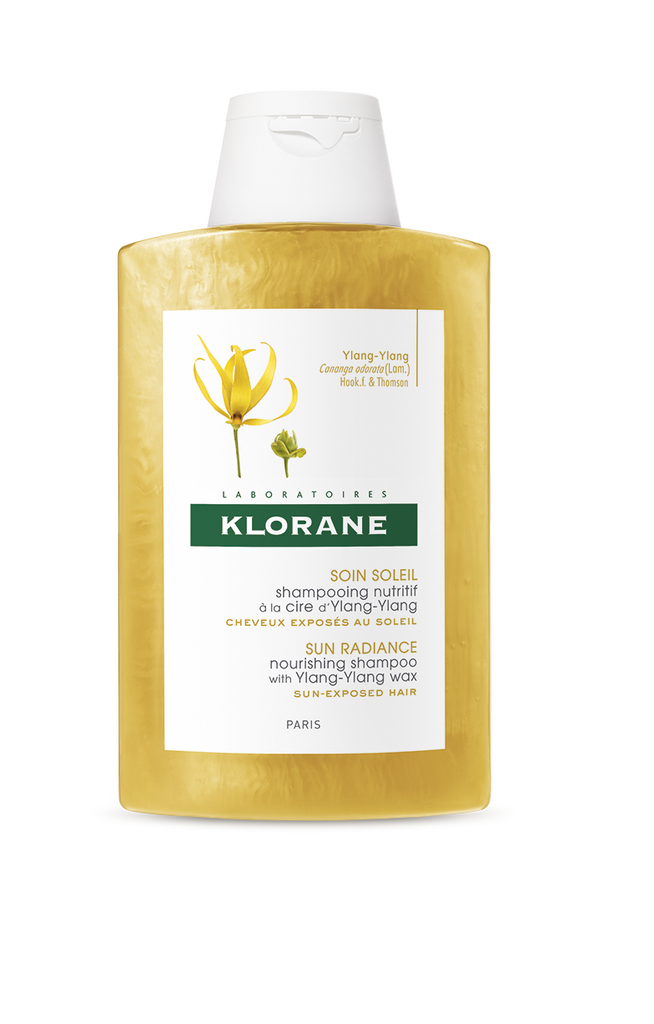 Klorane Capilar Champô Ylang Ylang para cabelos expostos ao sol nutre e protege a fibra capilar e a cor do cabelo. Antissal, antiareia e anticloro